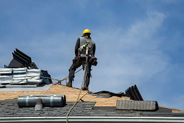 Professional Roof Replacement technician working in Sandstone, WV